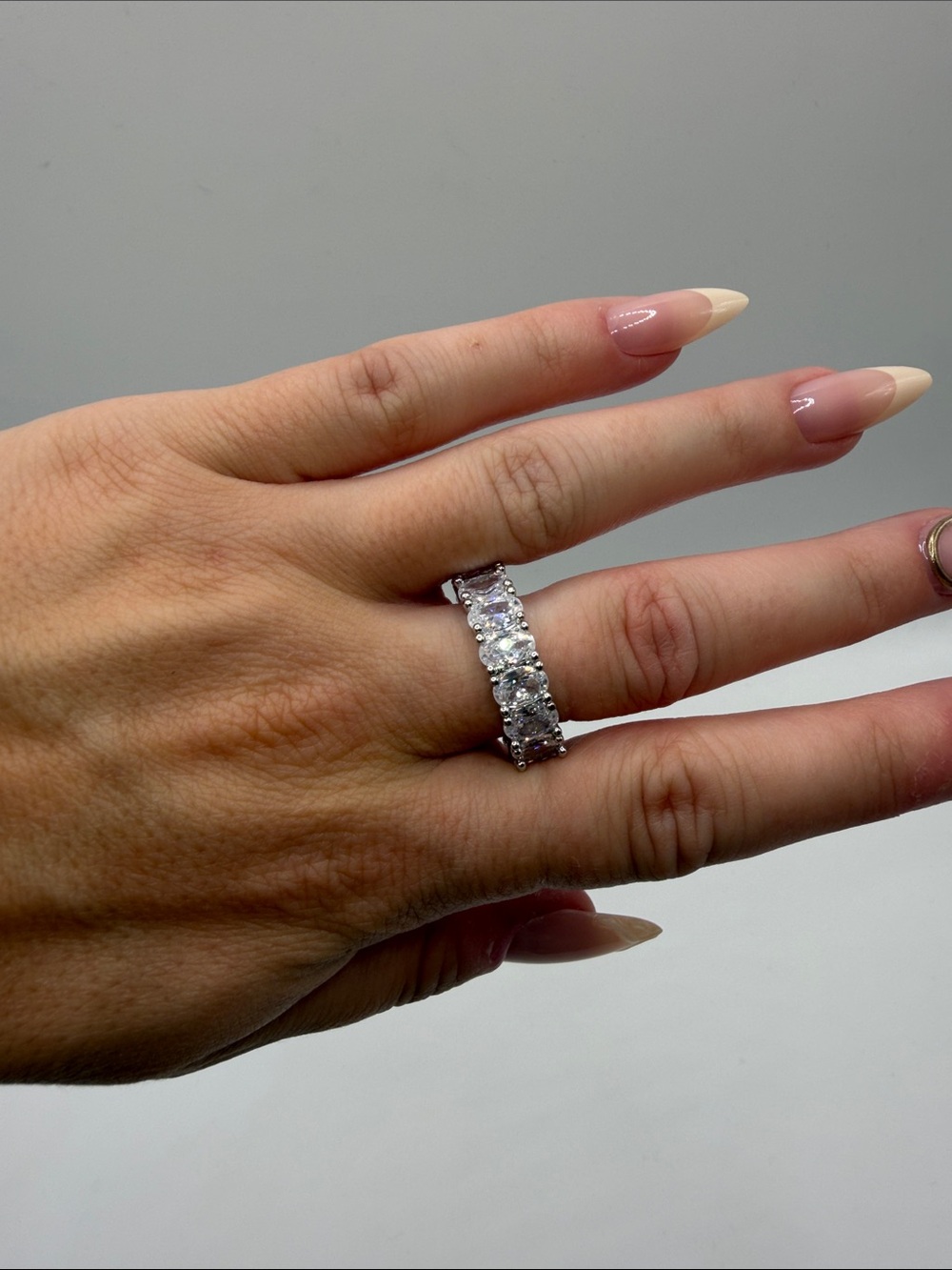 125. Diamond-Style White Gold Plated Eternity Band Size 7